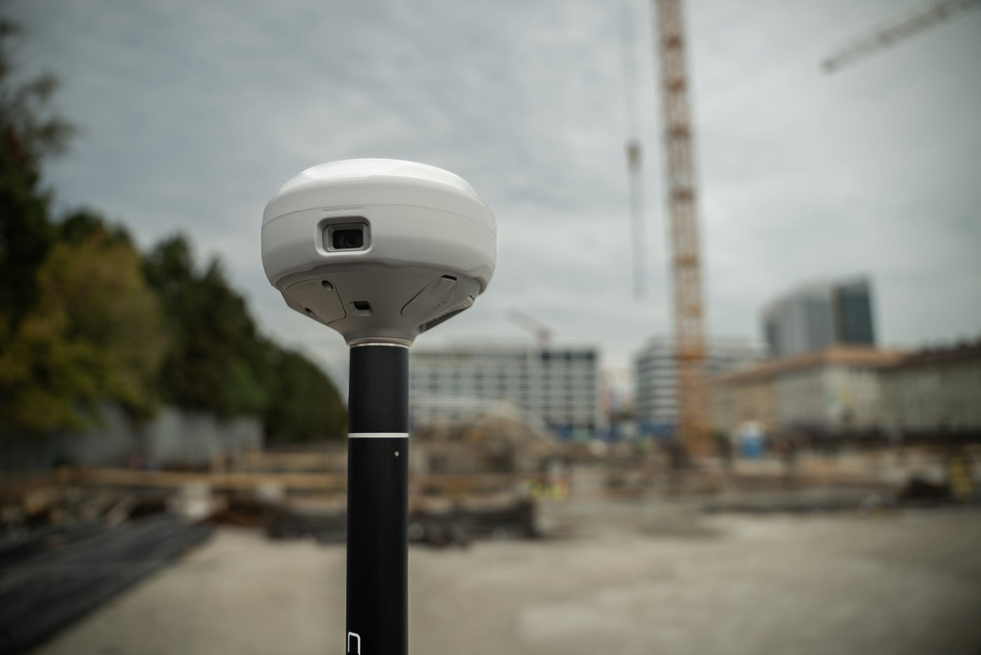An Emlid Reach RS4 Pro GNSS receiver, the class of instrument used to survey ground control points for a drone mapping flight