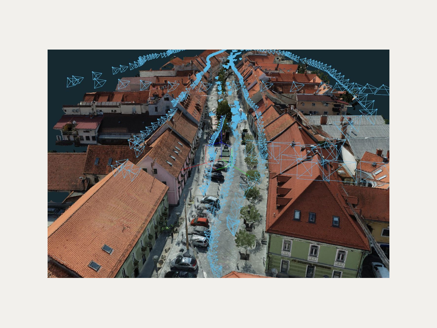 A 3Dsurvey reconstruction of an urban street, textured mesh with the camera positions shown
